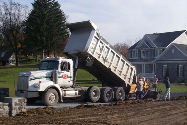 paving equipment at a residential paving job